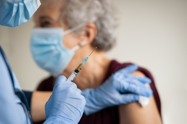 Image of a patient receiving a vaccine